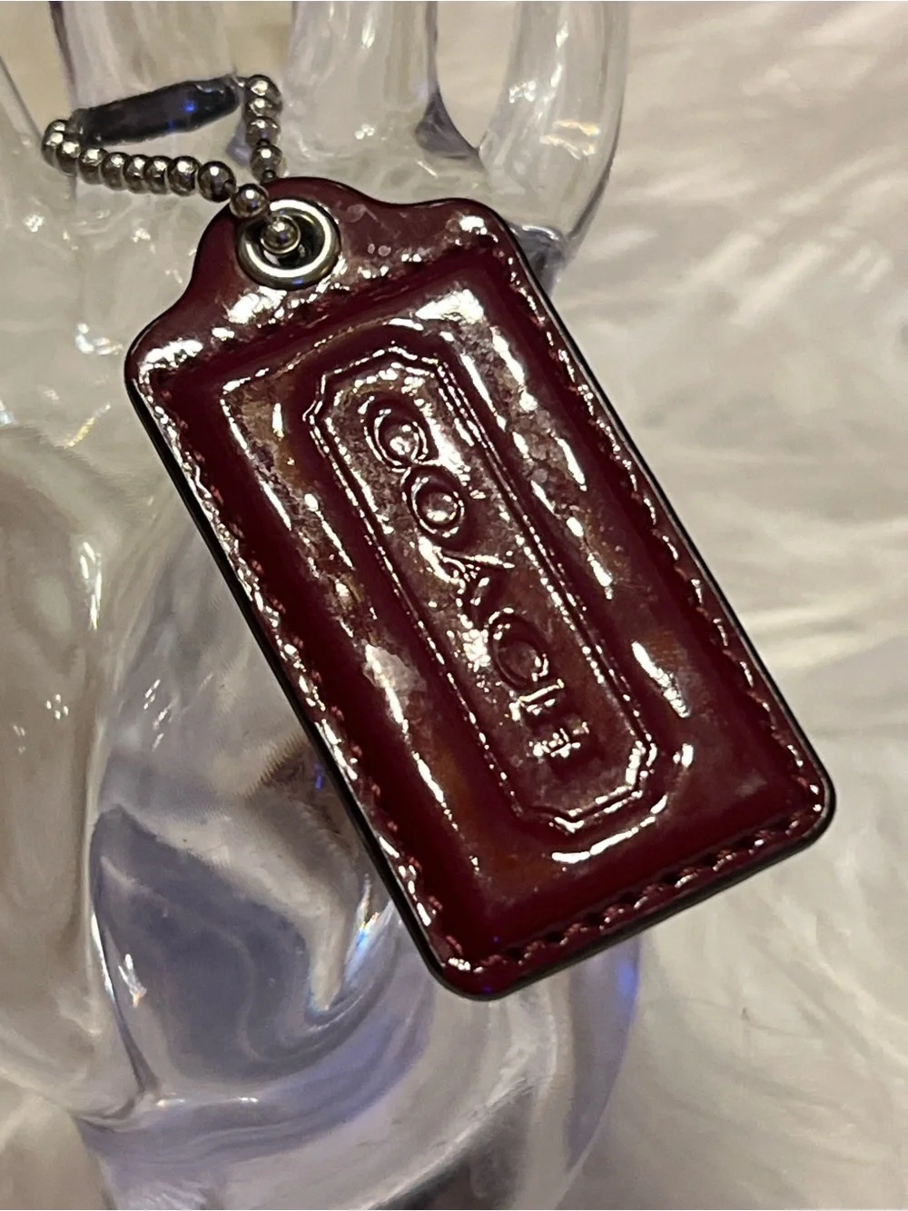Coach Patent Leather Tag in Deep Burgundy